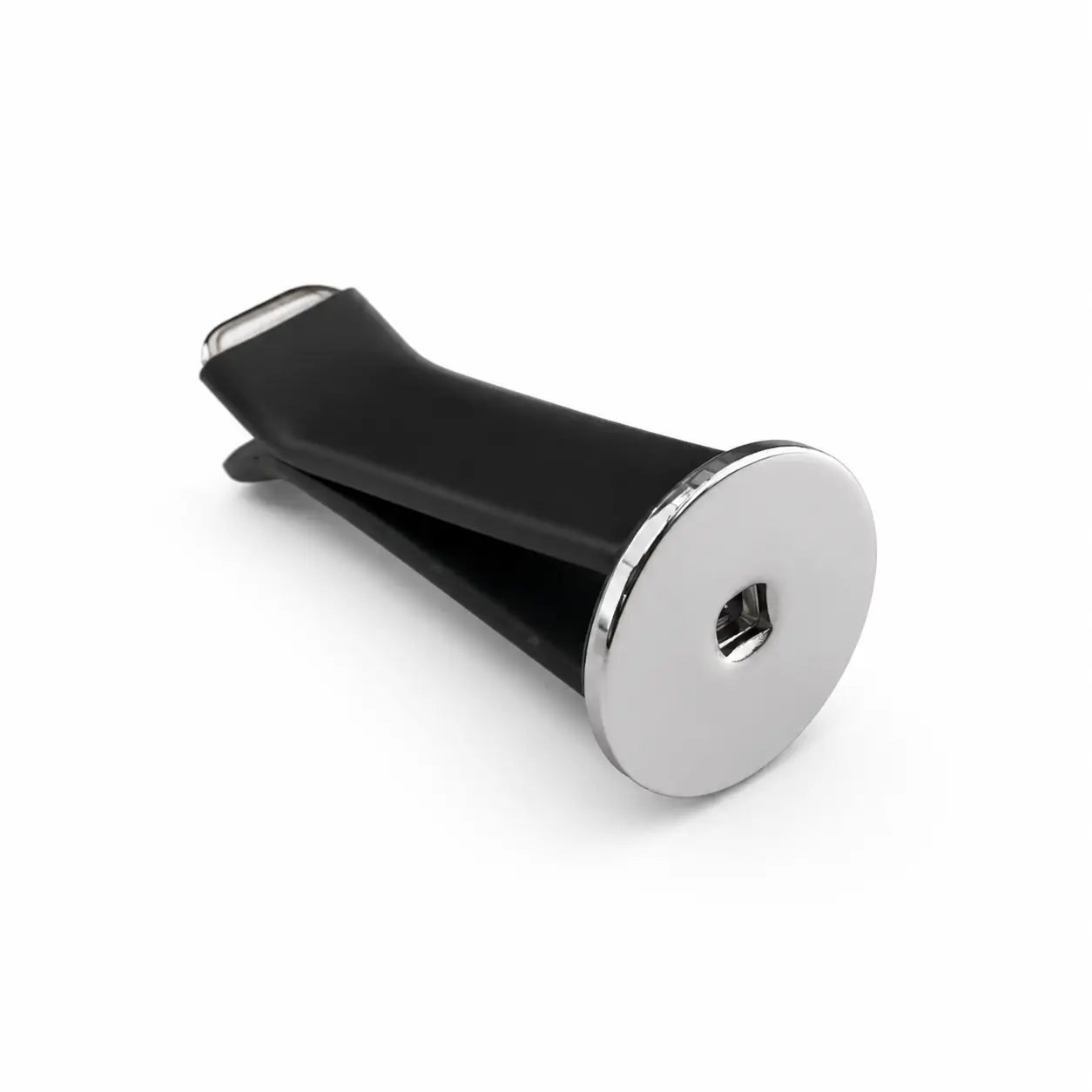 Side view of a black-and-white dog head car vent clip accessory mounted on a metallic ring and V-shaped clamp, isolated on a clean white studio background with minimal shadows, product-style presentation.