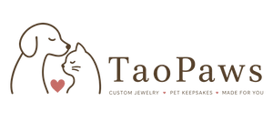 Circular TaoPaws logo featuring a minimalist dog and cat illustration with a subtle pink heart. Ideal for branding pet jewelry, personalized gifts, and keepsakes.